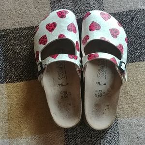 Cream, red, and black heart design Birki's